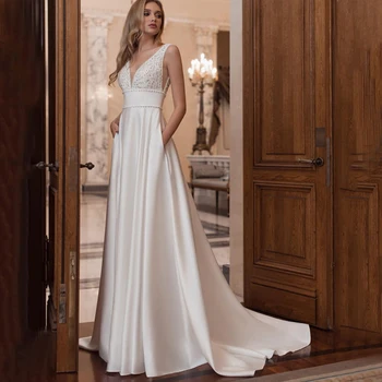 Классическое атласное свадебное платье без рукавов с глубоким V-образным вырезом, расшитое бисером и карманами, Трапециевидное Свадебное платье длиной до пола на молнии со шлейфом